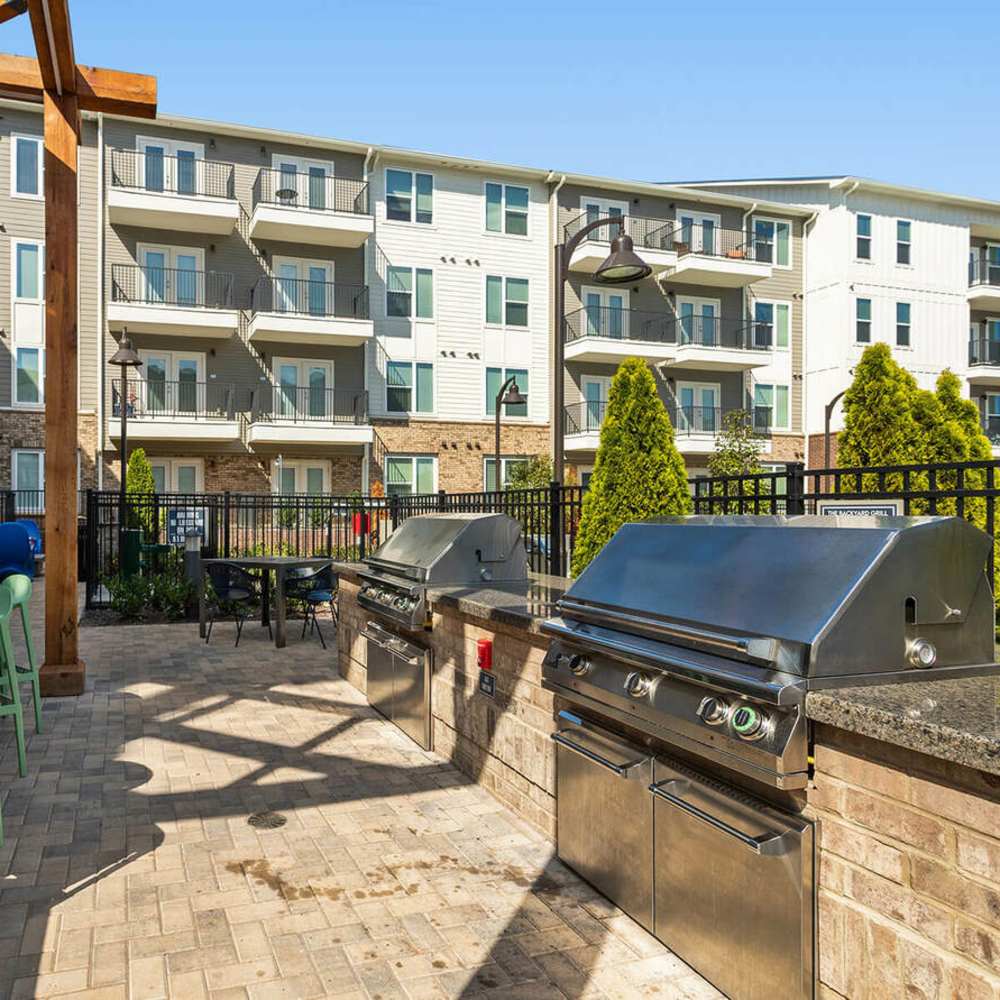 Luxury outdoor grilling area at The Reid in Tucker, Georgia