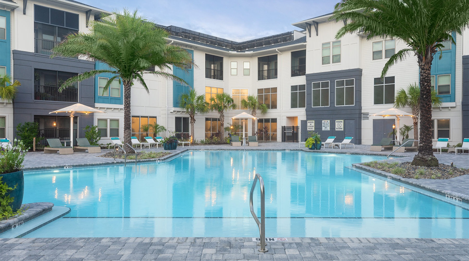a pool in front of a building