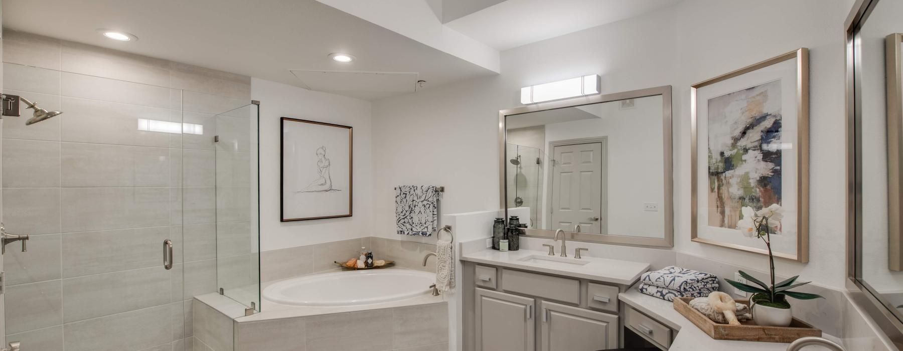 a bathroom with a tub sink and a toilet