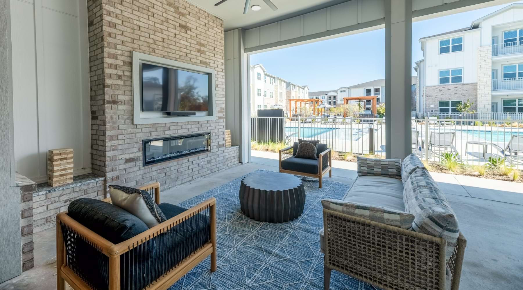 Outside courtyard area near the pool at Ascend at 720 apartments in Cross Roads, Texas.