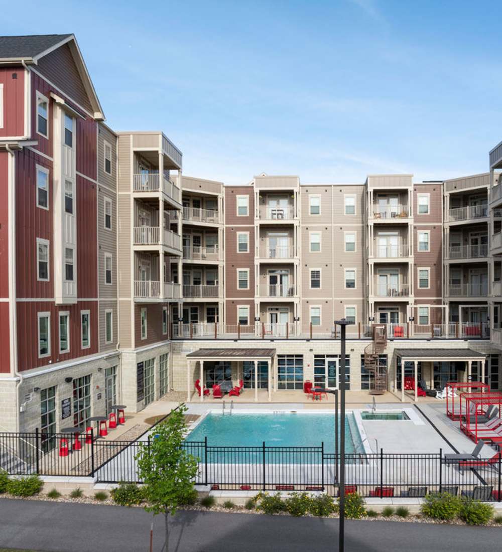 Charming community with swimming pool view at Atlas on 17th in Bloomington, Indiana