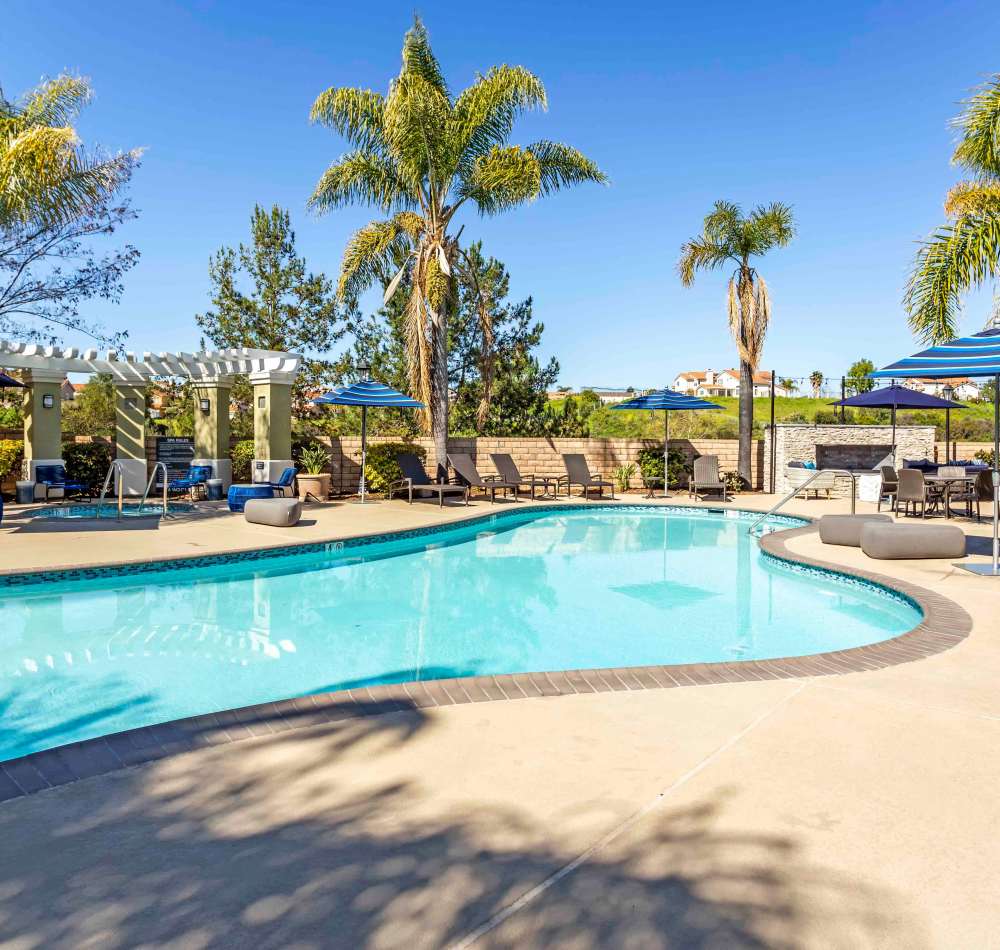 Resort-style swimming pool on a beautiful day at Sofi Highlands in San Diego, California