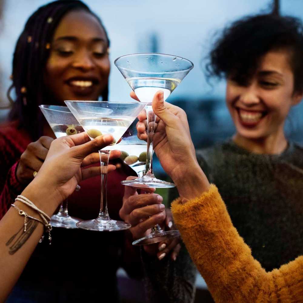 Friends having drinks near The Moran in Oakland, California