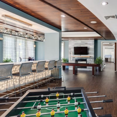 Clubhouse with foosball at Arcadia at Rivers Edge in Medford, Massachusetts