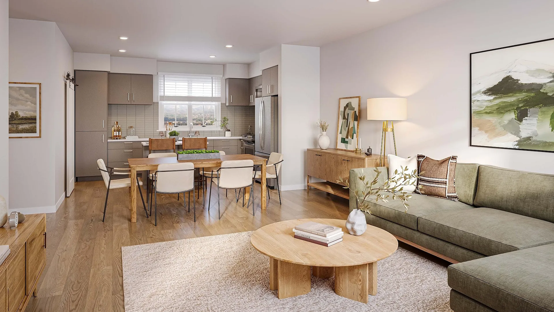 Contemporary open-plan living room with a cozy sectional sofa, stylish dining area, and modern kitchen, featuring elegant wooden flooring and chic decor.