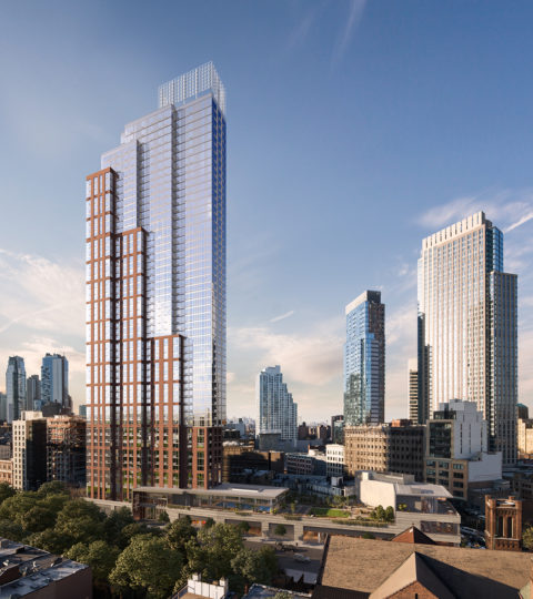 view of the hub's brick and glass facade
