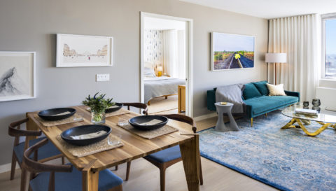 living room with dining area and bedroom