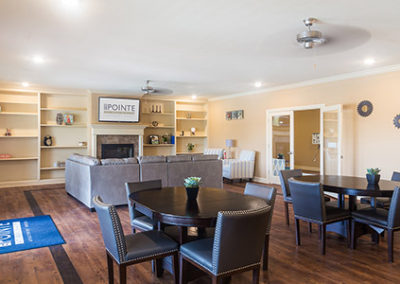 Stallion Pointe clubhouse community area with couches and tables