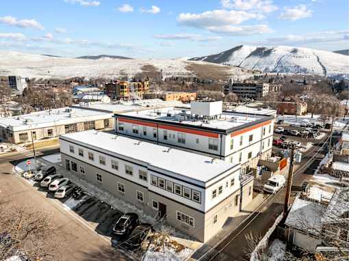 large building with a red stripe at Spruce Street, Missoula Montana