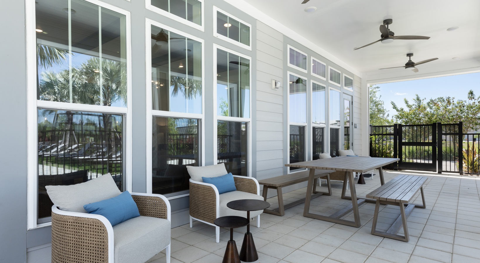 Outdoor seating and relaxation area at Madison Waterstar apartments near Sunset Walk Kissimmee.