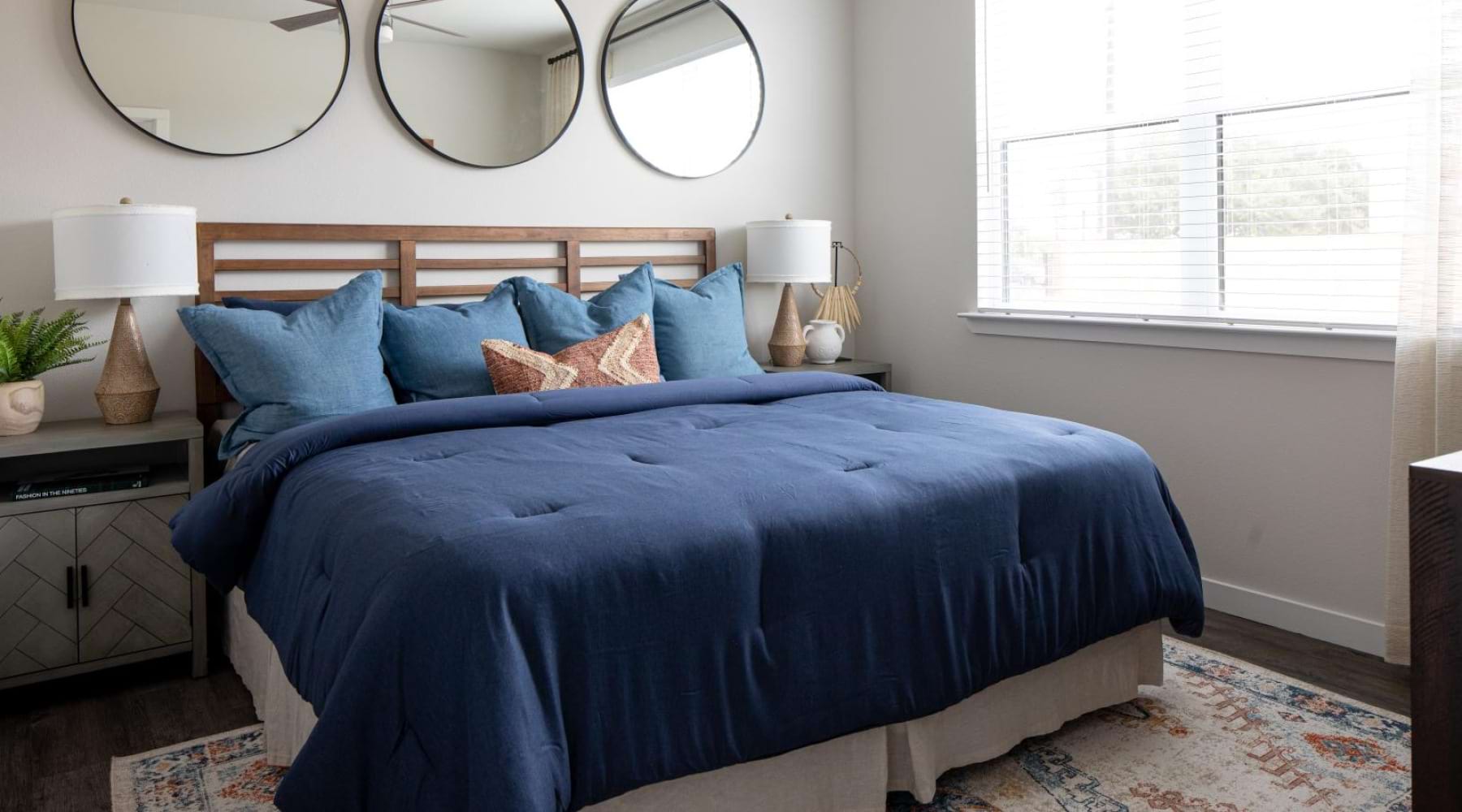 Inviting bedroom within the Bellrock Memorial's modern apartments for rent.