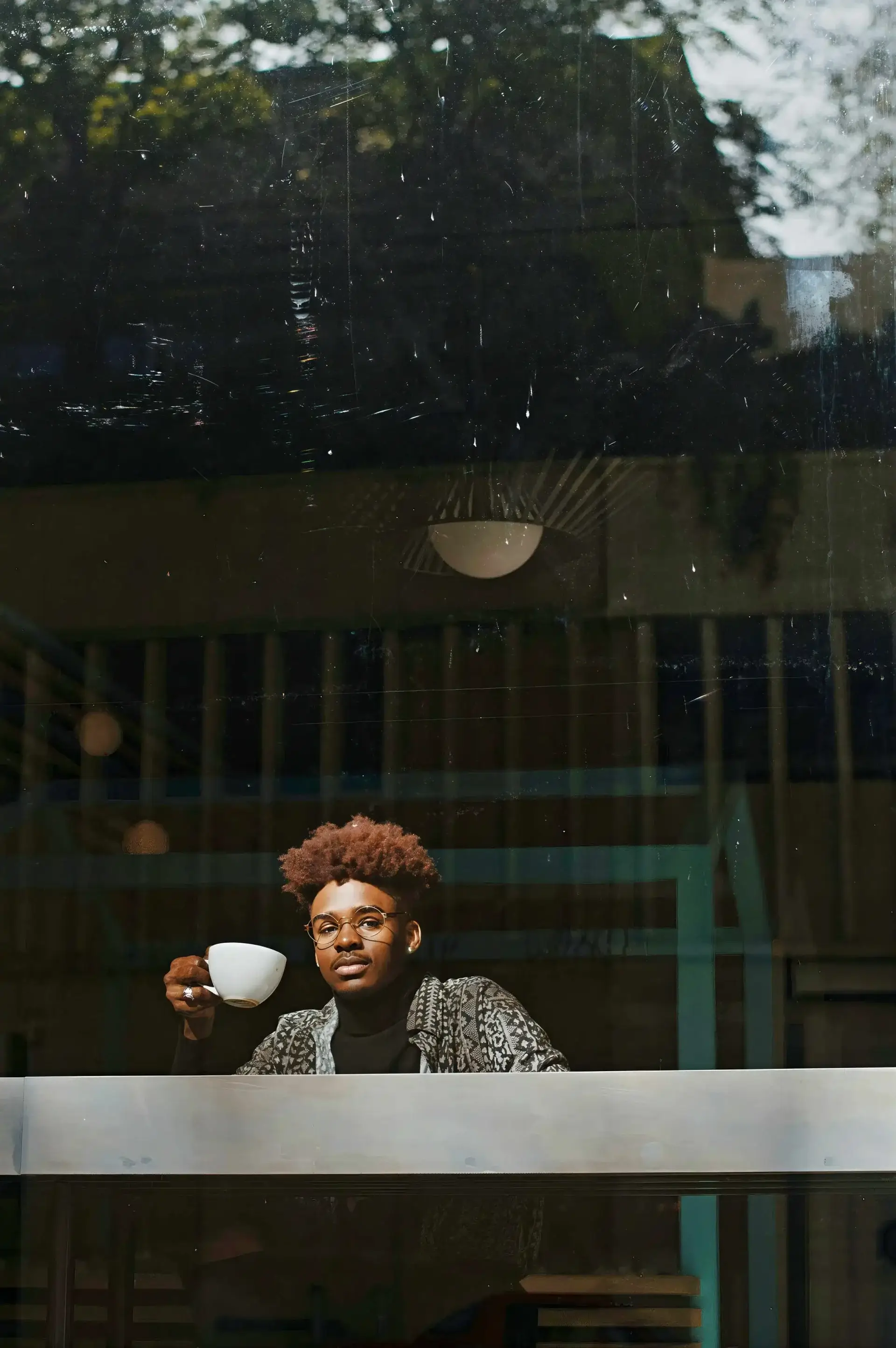 the marlow man at window cafe