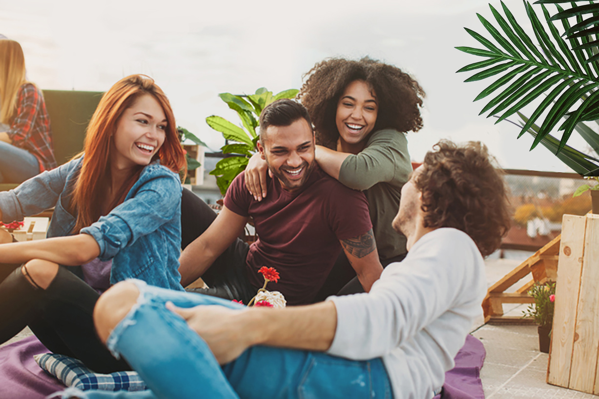 people laughing in floral background
