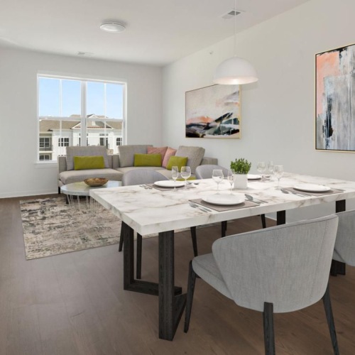 a dining room with a table and chairs