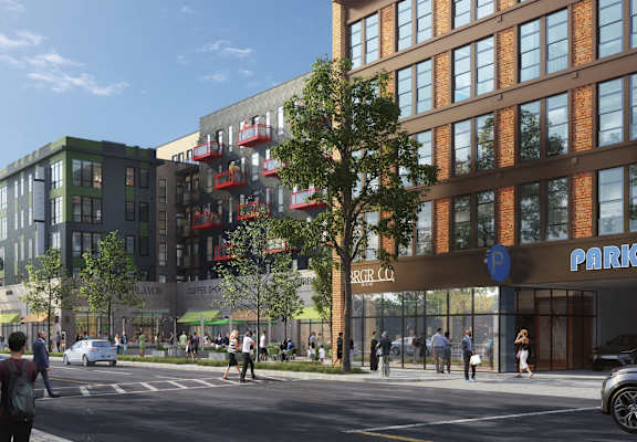 A street view of a city with cars, pedestrians and buildings. at Canvas, Hyattsville, MD, 20781