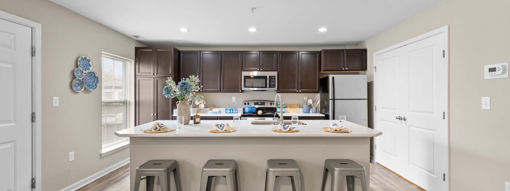 Kitchen with bar seating at The Gathering in Salisbury, Maryland