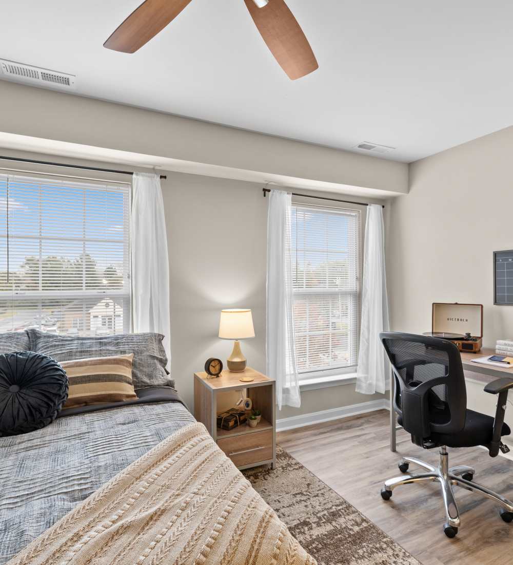 Resident lounge with fireplace at The Gathering in Salisbury, Maryland