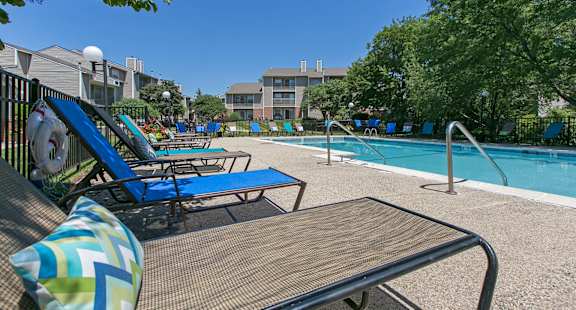 Swimming pool with loungers