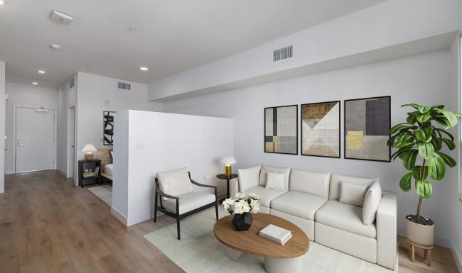 a living room with a couch and a table