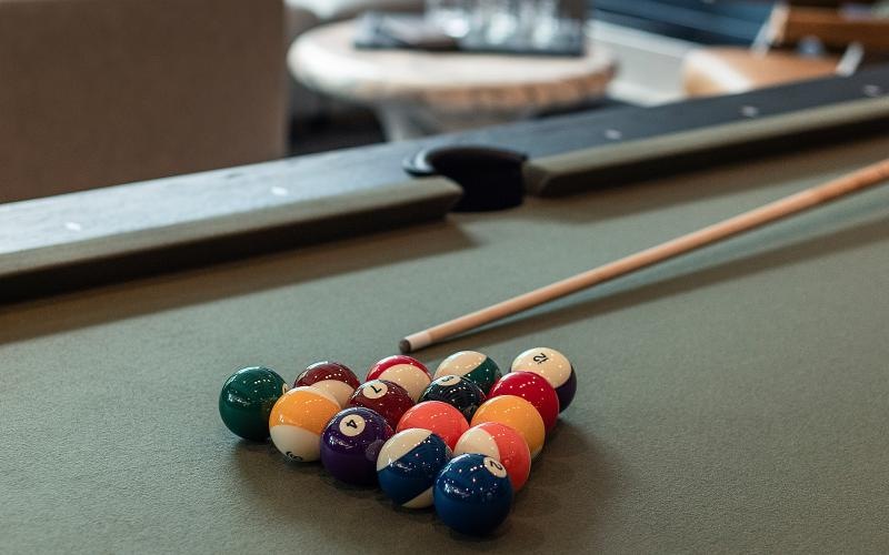 a pool table with balls on it