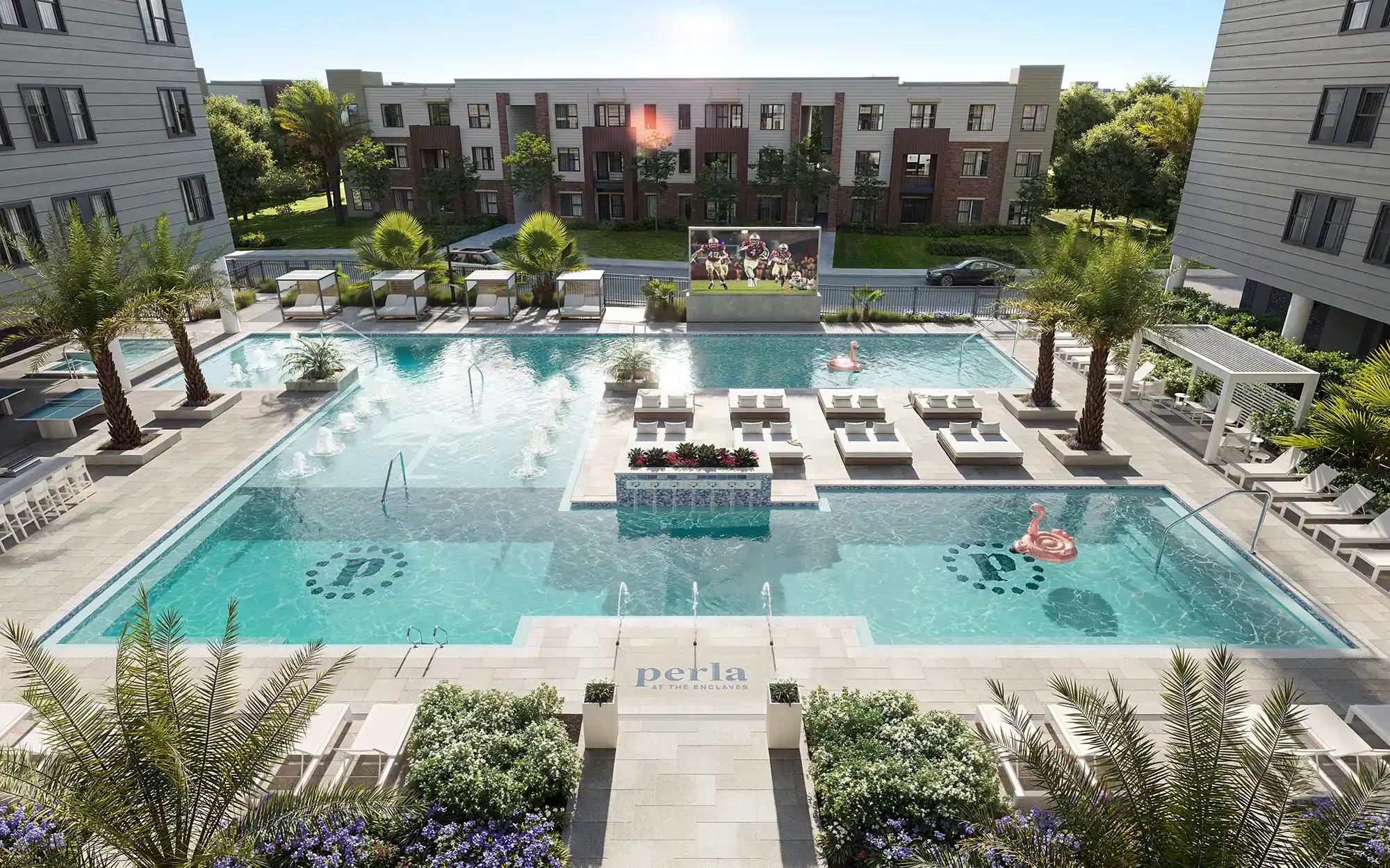 Balcony view of the pool and lounge area at Perla's luxury Tallahassee, FL, student apartments near the FSU campus, featuring lounge chairs, cabanas, and a big screen for watching FSU games
