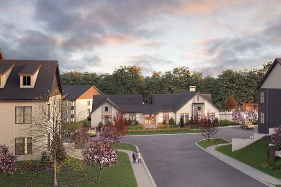 A residential area with houses and a road.