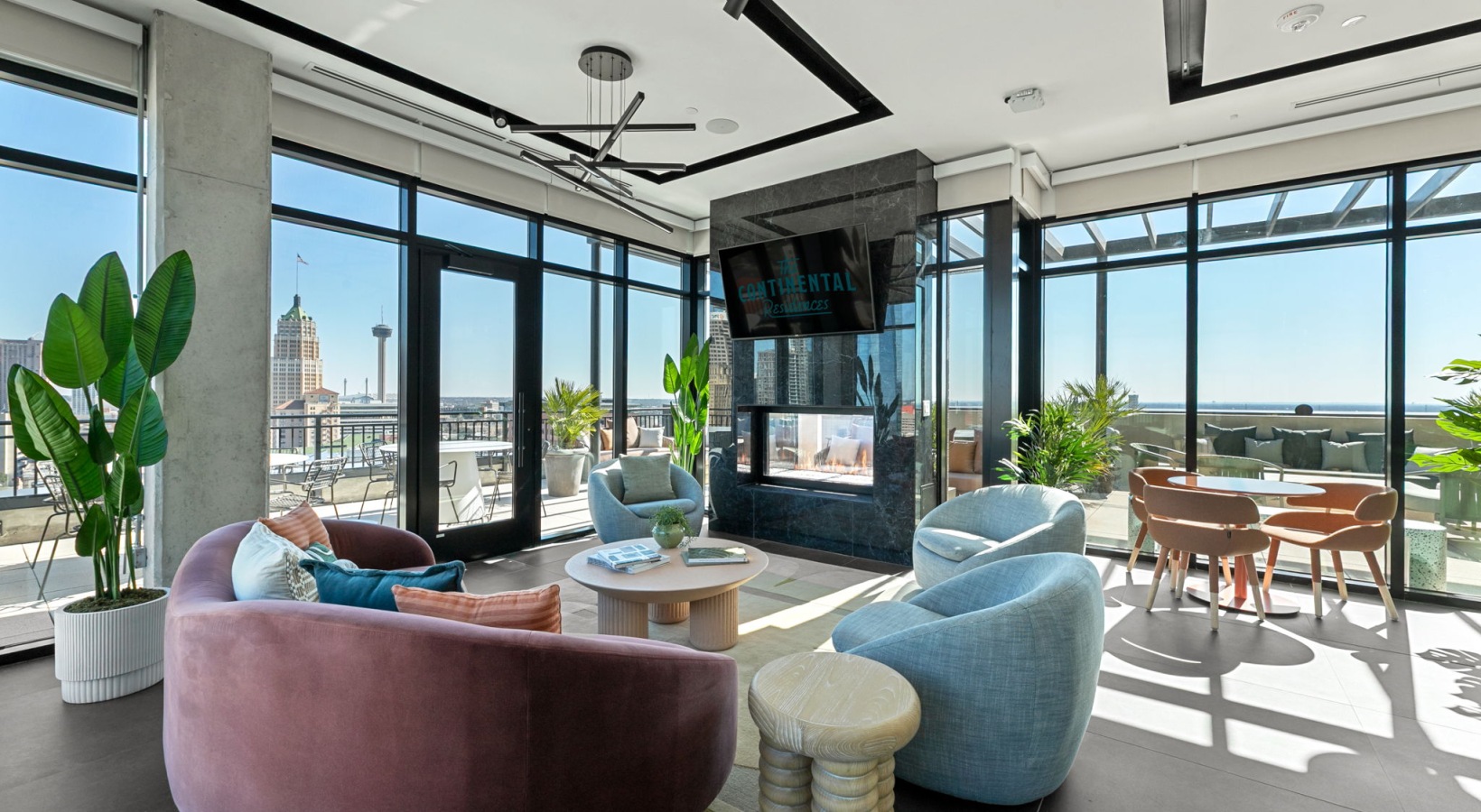 Chairs with tables and a TV 