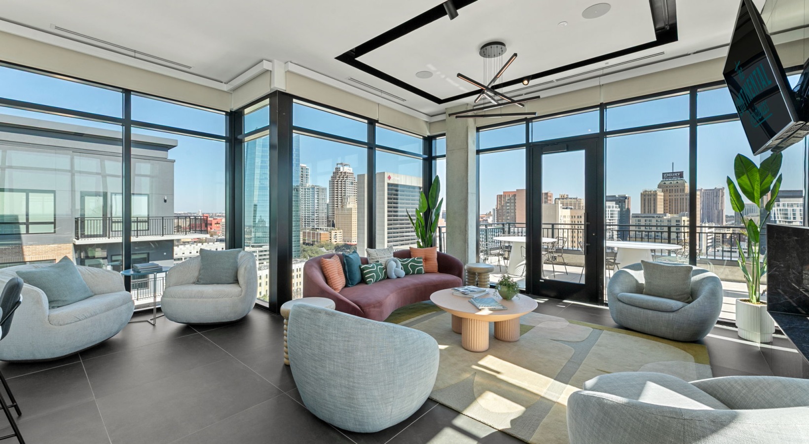couches in a room with a table 