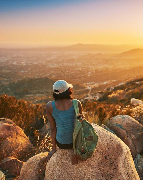 A street view of El Cajon with a sunset in the background.