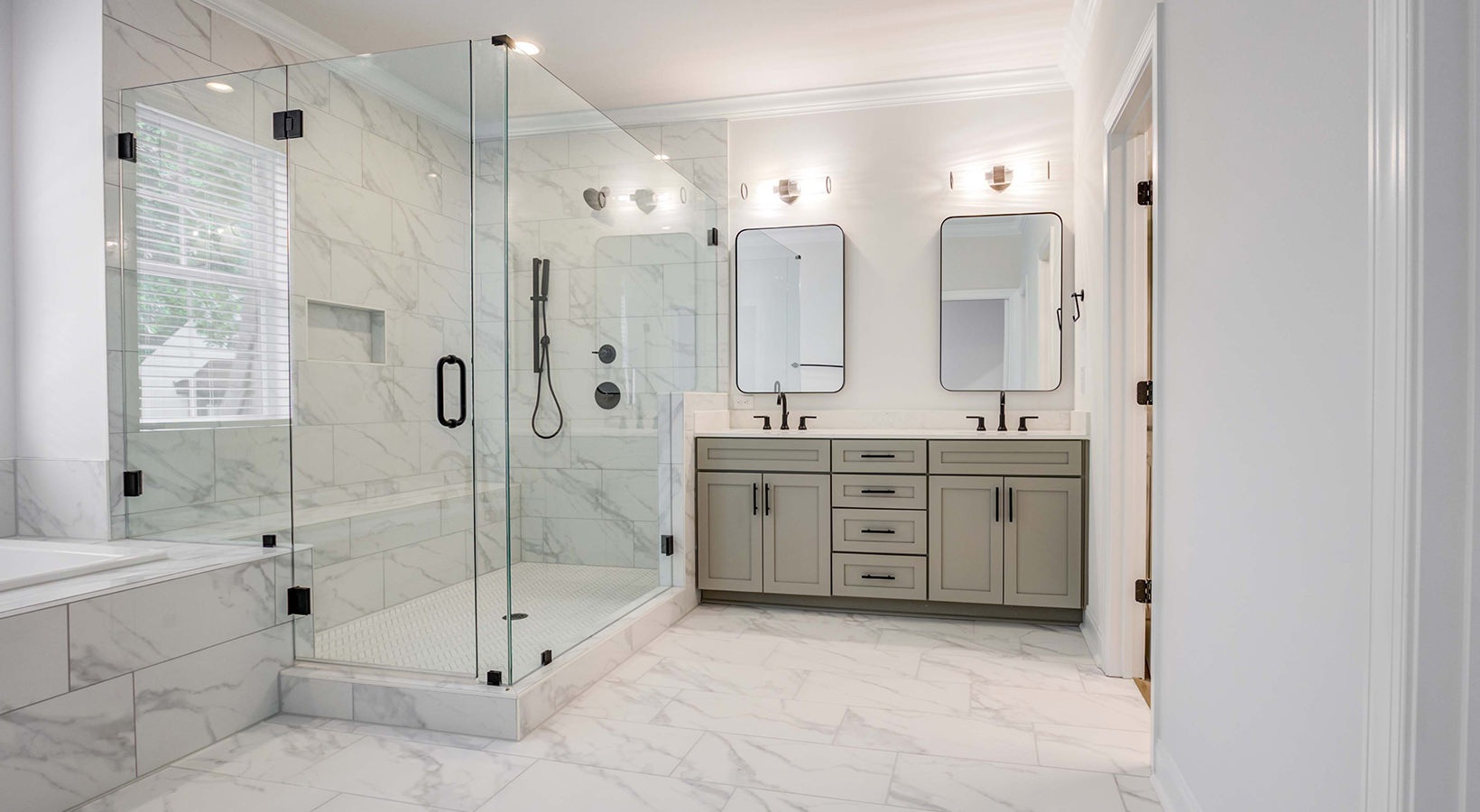 tiled bathroom with large shower