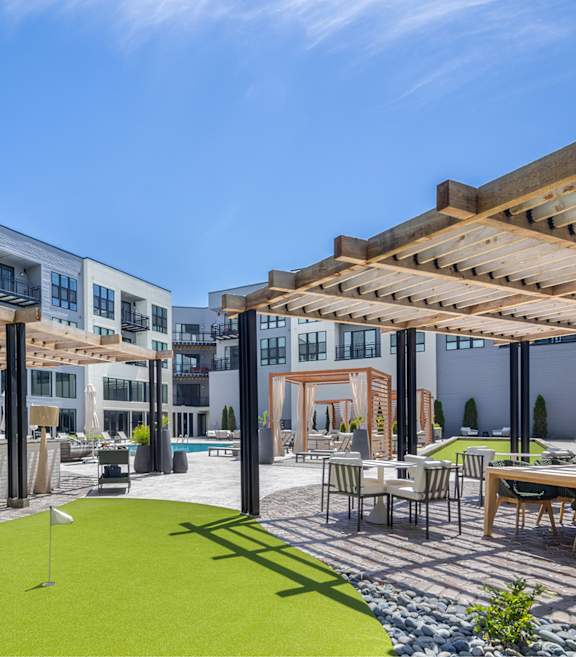 Outdoor Kitchen with seating area at Plaza at Pinnacle Hills Apartments, Rogers, 72758