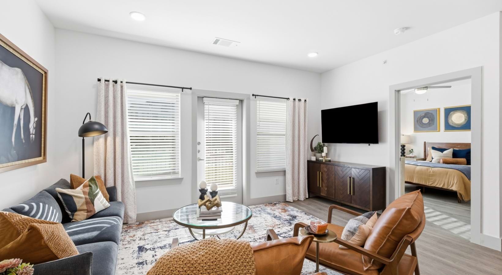 living room with seating and tv