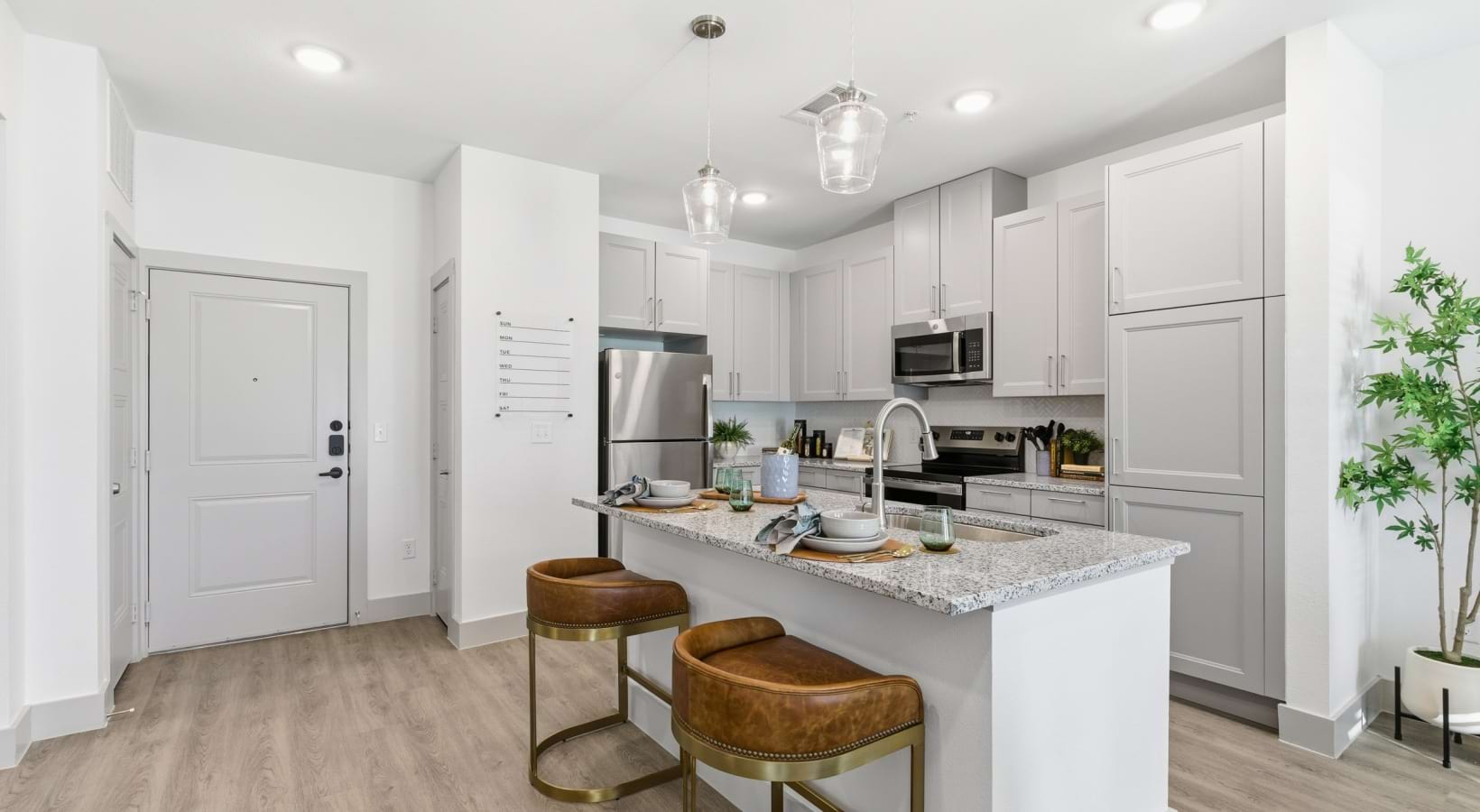 kitchen stainless steel appliances island dining