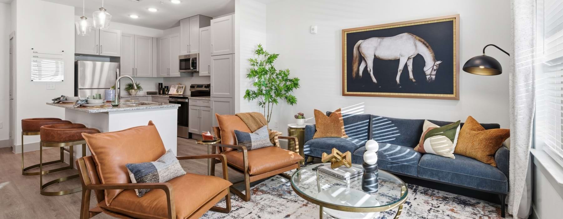 living room with seating and artwork