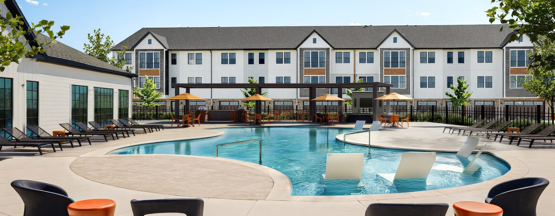 resort-style swimming pool at Amplify Tomball, luxury apartments Tomball, TX