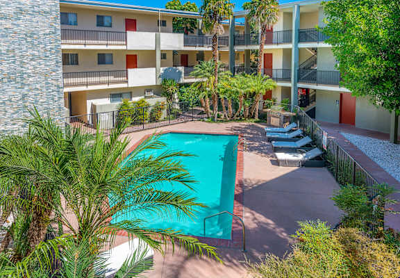 view of pool area with lounge chairs