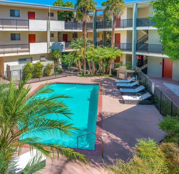 view of pool area with lounge chairs
