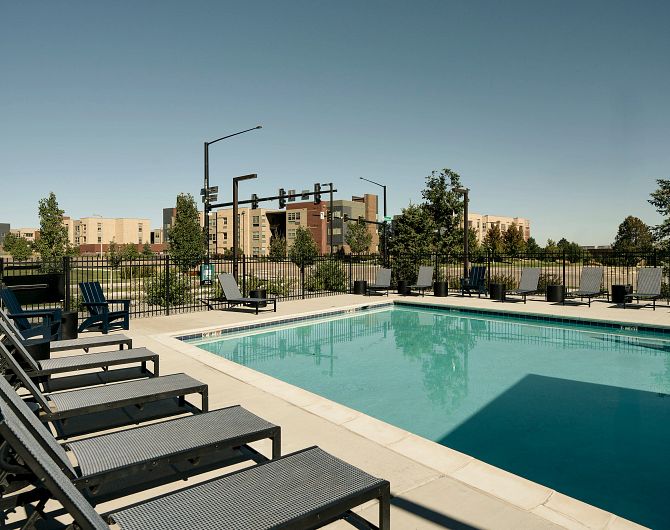 alt="Relax under big blue skies by the pool"