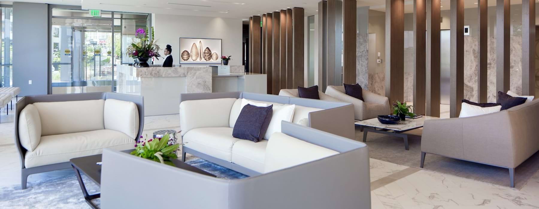 a clubroom with couches and chairs