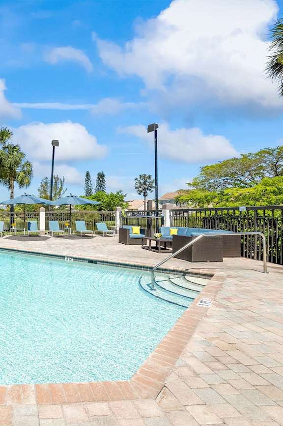 Pool Side Relaxing Area at Waterview at Coconut Creek, Florida