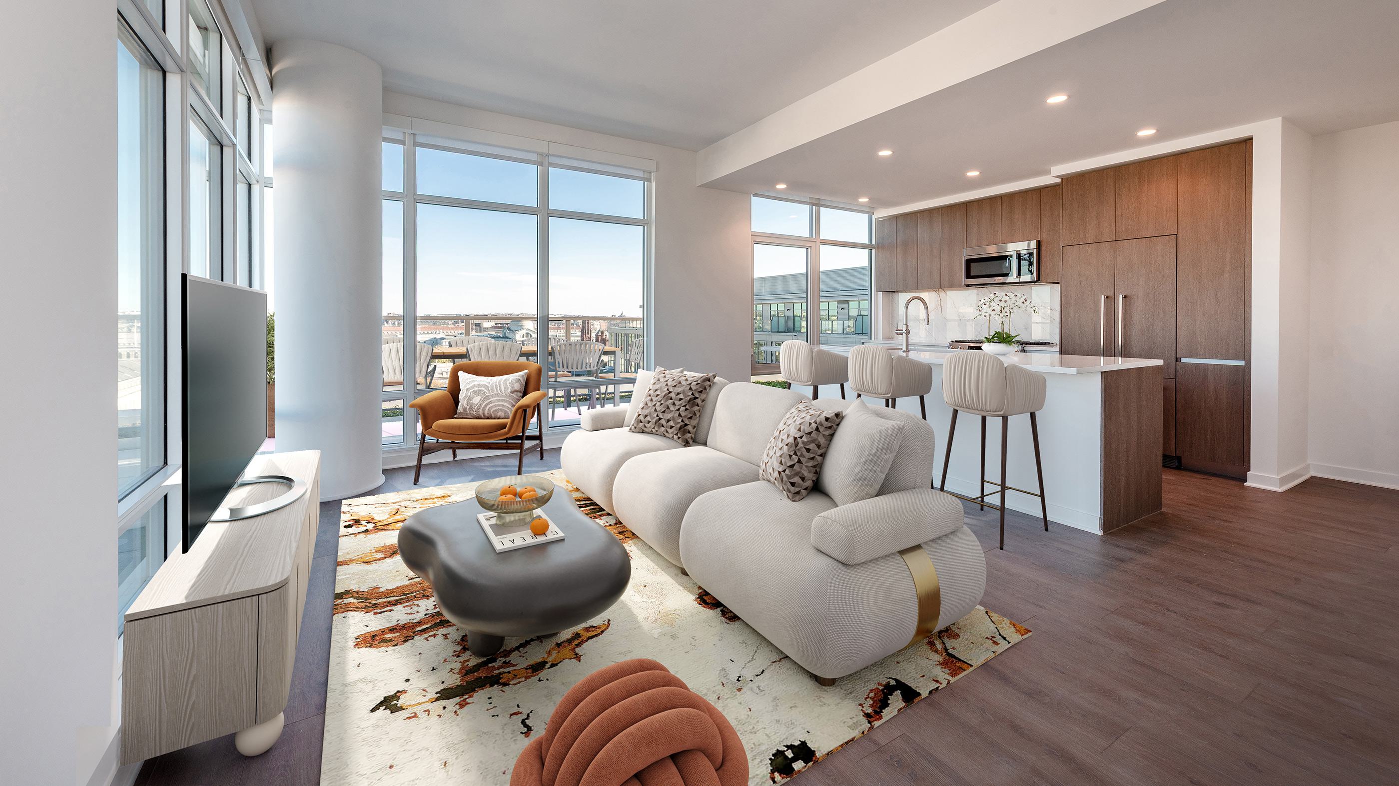 Modern open-concept apartment at The Collection at Annex on 12th, featuring a sleek kitchen with wood cabinetry, sculptural furniture, and floor-to-ceiling windows with views of Southwest DC