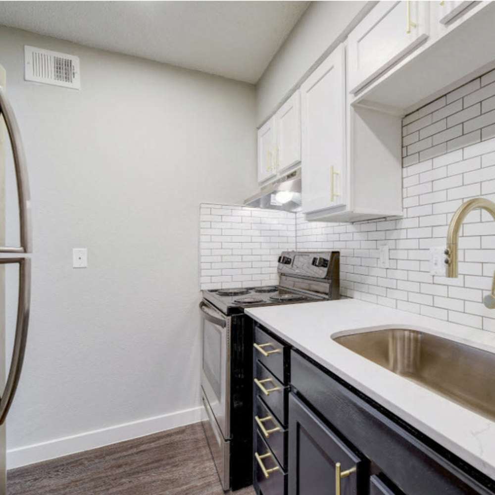 Kitchen with white color cabinet at Sangria Park in Austin, Texas