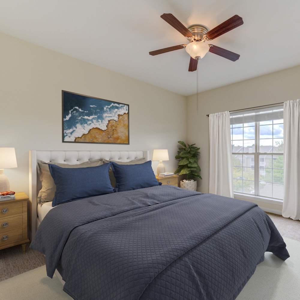 Bedroom with elegant decor and natural light at Boulder Springs in Maryland Heights, Missouri.