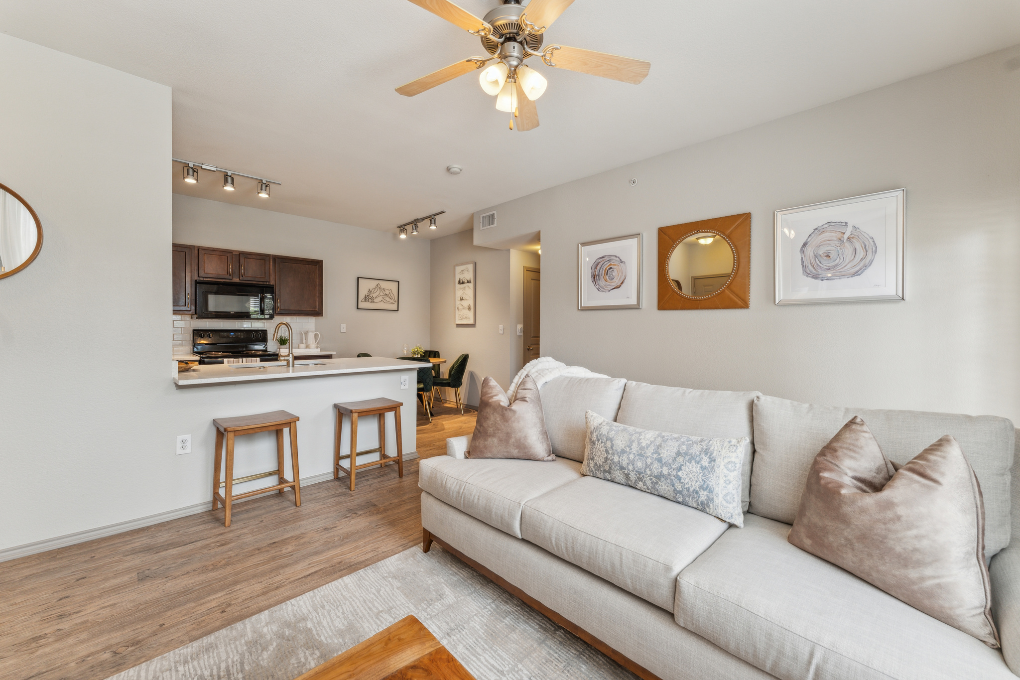 a living room with a couch and coffee table at The  Wyatt at Presidio Junction