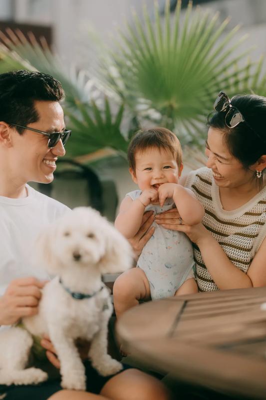 family with young baby and white dog modera scottsdale