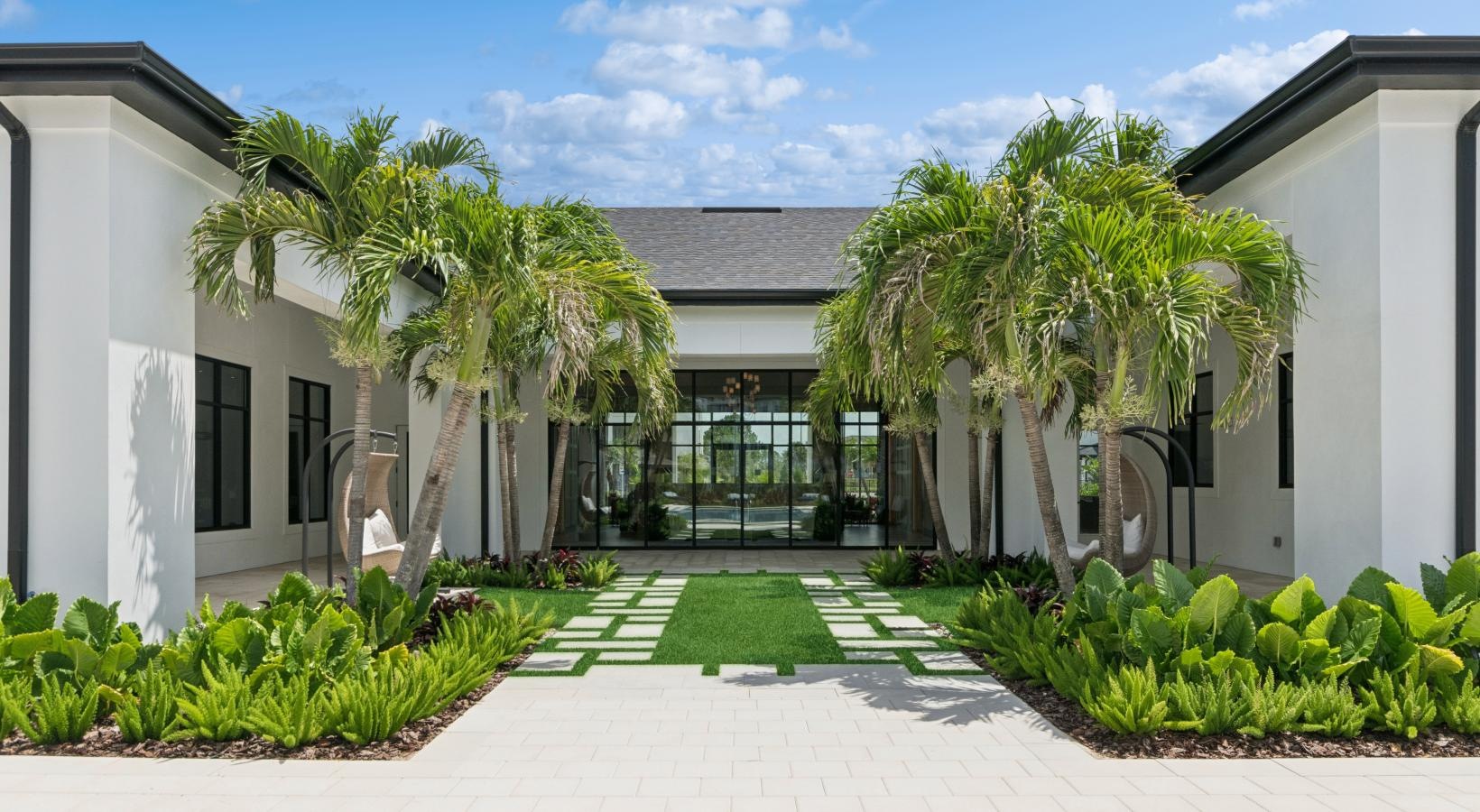 a building with palm trees