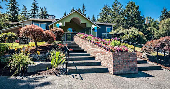 A house with a driveway at Brackett Apartments, Edmonds, 98020