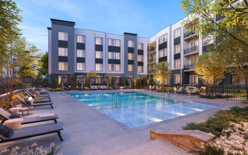a swimming pool in front of a building