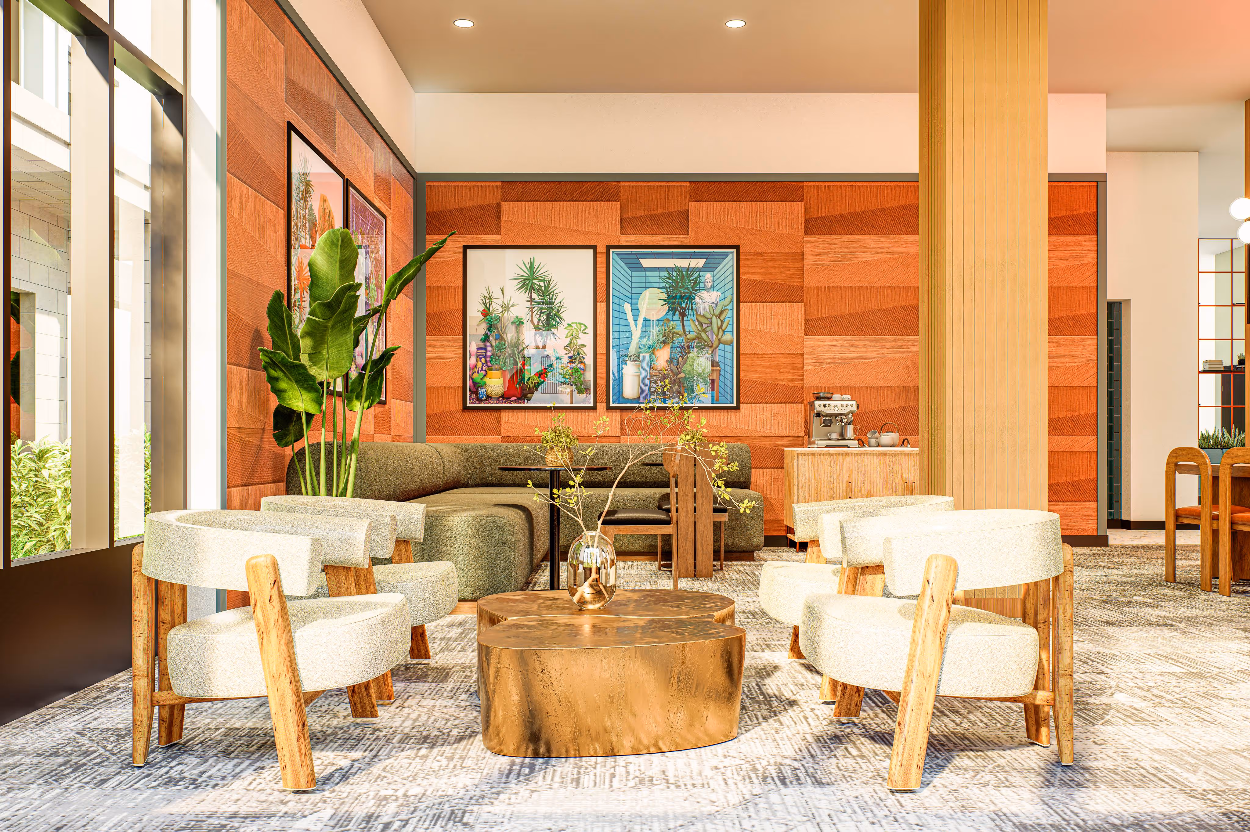 Comfortable resident seating area in the lounge with textured orange walls, plush chairs, and a unique bronze coffee table at ArtHaus Telegraph in Berkeley, CA.