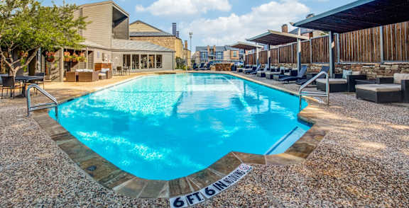 A swimming pool with a 6FT6 sign on the ground.